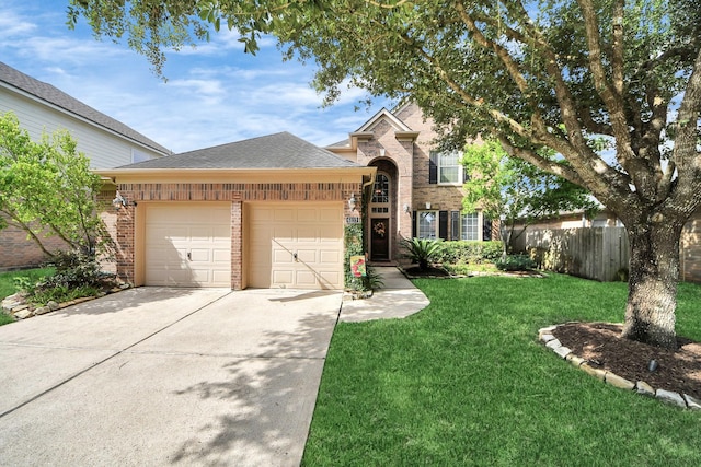 6111 Meadowstream Ct, Katy, TX 77450 - traditional home with brick siding, an attached garage, concrete driveway, and roof with shingles