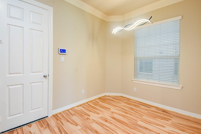 14431 Basalt Ln, Houston, TX 77077 - spare room with ornamental molding and light wood-style flooring