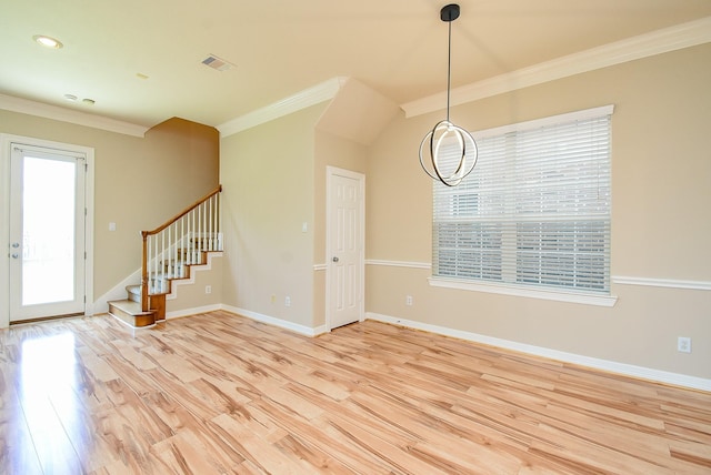 14431 Basalt Ln, Houston, TX 77077 - foyer featuring crown molding, light wood finished floors, stairs, a chandelier, and recessed lighting