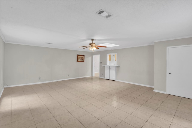 11515 Duane St, Houston, TX 77047 - empty room featuring ceiling fan, crown molding, and a skylight