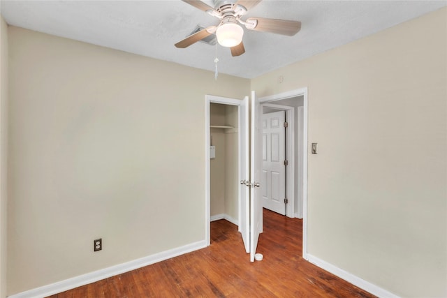 11515 Duane St, Houston, TX 77047 - unfurnished bedroom with wood finished floors, a closet, and a ceiling fan