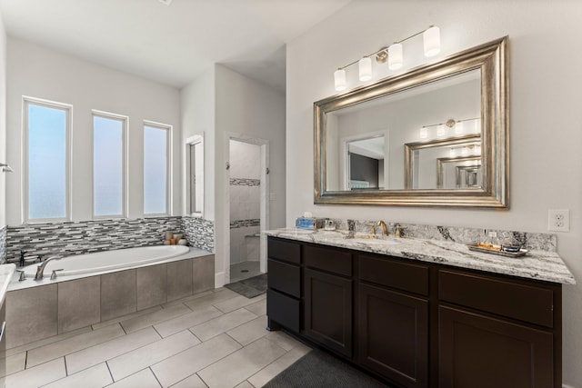 22 Mayapple Blossom Pl, Tomball, TX 77375 - bathroom featuring vanity, a garden tub, tiled shower, and tile patterned floors