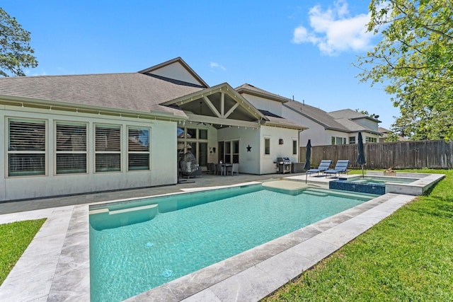 22 Mayapple Blossom Pl, Tomball, TX 77375 - view of swimming pool with a patio area, area for grilling, and a pool with connected hot tub
