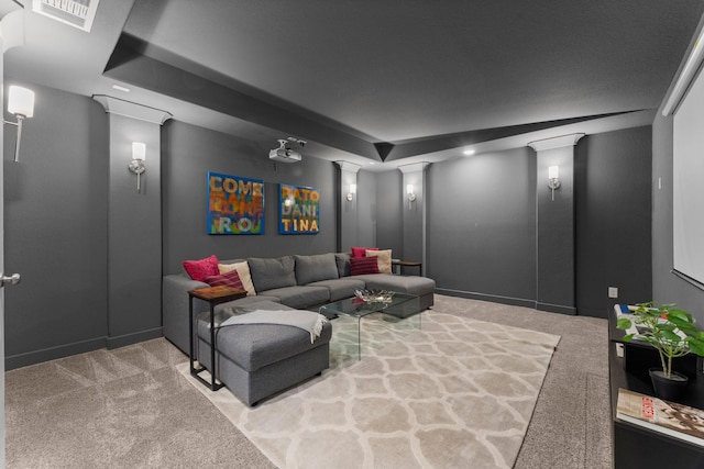 22 Mayapple Blossom Pl, Tomball, TX 77375 - carpeted home theater with decorative columns and baseboards