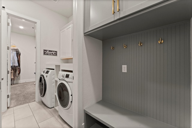 22 Mayapple Blossom Pl, Tomball, TX 77375 - laundry area featuring cabinet space, separate washer and dryer, light tile patterned floors, and light colored carpet