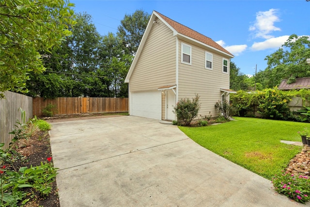 4511 Palo Pinto Dr, Houston, TX 77041 - view of side of home featuring driveway, a garage, and a shingled roof