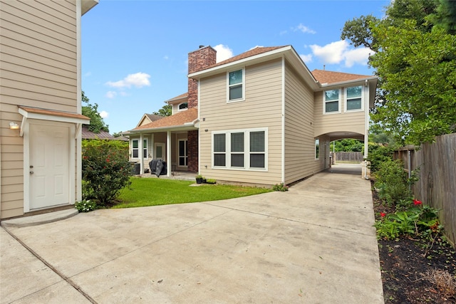 4511 Palo Pinto Dr, Houston, TX 77041 - back of property with a chimney and a shingled roof