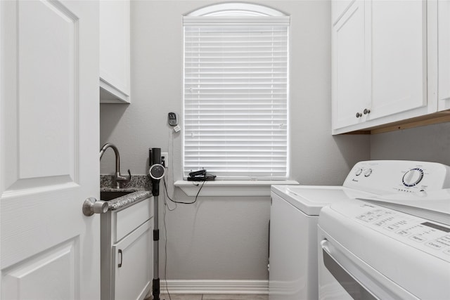 4511 Palo Pinto Dr, Houston, TX 77041 - washroom featuring independent washer and dryer and cabinet space