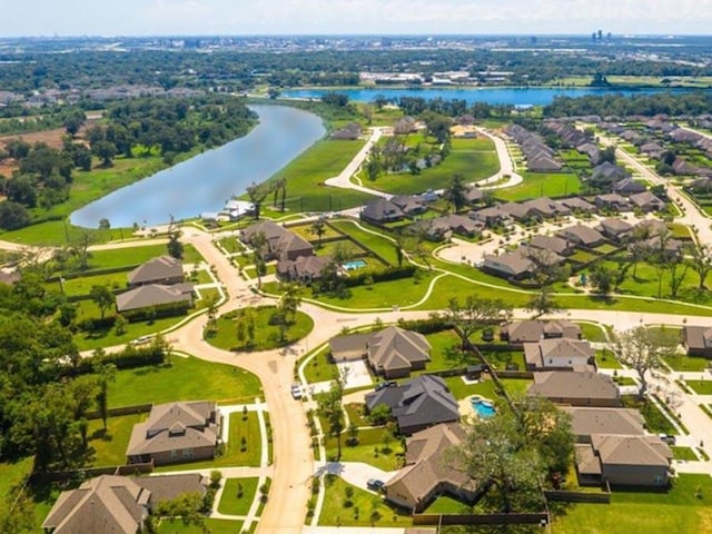 101 Water Grass Trl, Clute, TX 77531 - aerial perspective of suburban area featuring a nearby body of water