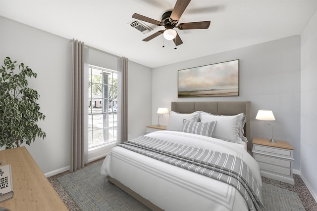 1310 Beaver Bend Rd, Houston, TX 77088 - carpeted bedroom with baseboards and ceiling fan