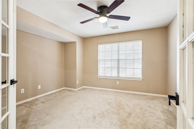 3919 Park Circle Way, Houston, TX 77059 - spare room featuring carpet floors, a ceiling fan, and french doors