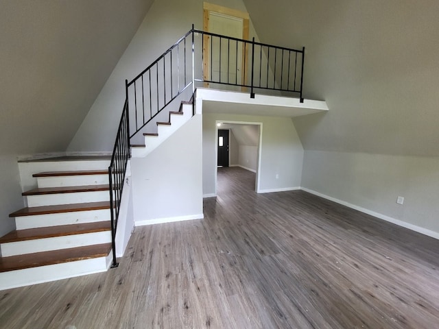 4520 County Road 929c, Brazoria, TX 77422 - staircase with wood finished floors and lofted ceiling