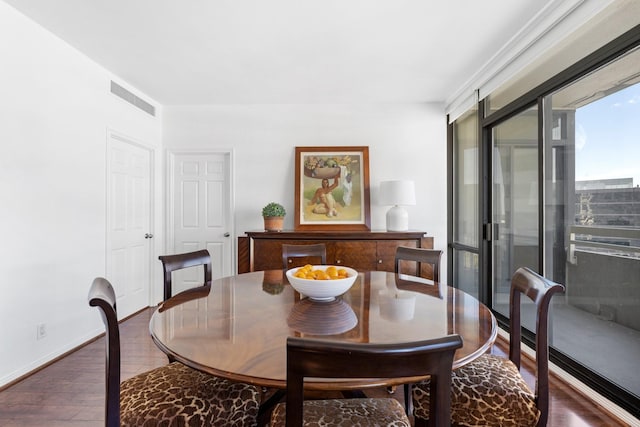 14 Greenway Plz Unit 12L, Houston, TX 77046 - dining area featuring wood finished floors