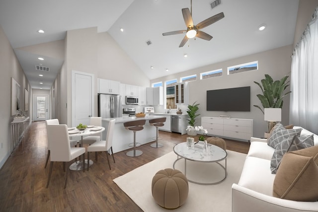5415 Margarita St, Houston, TX 77020 - living area with high vaulted ceiling, dark wood-style floors, a ceiling fan, and recessed lighting