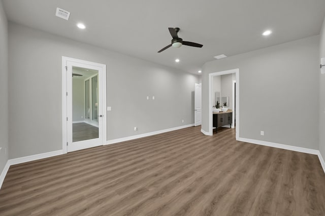 2172 Greentree Dr, Huntsville, TX 77340 - empty room featuring ceiling fan, wood finished floors, and recessed lighting