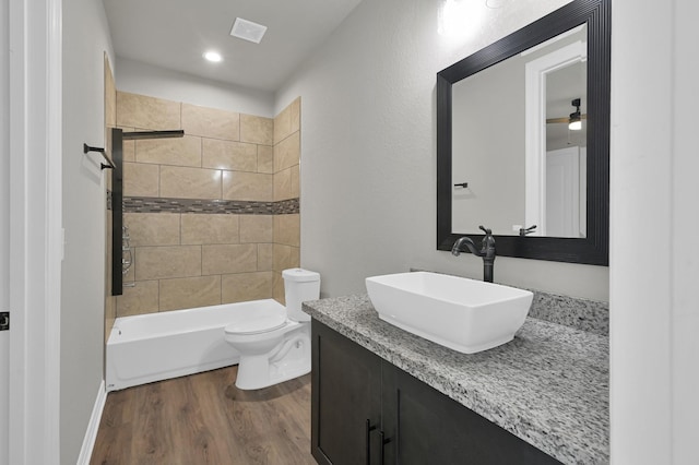 2172 Greentree Dr, Huntsville, TX 77340 - bathroom with vanity, wood finished floors, and shower / bathtub combination