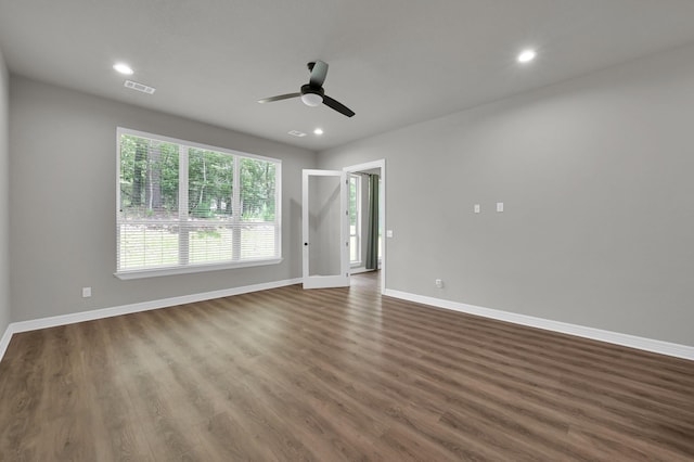 2172 Greentree Dr, Huntsville, TX 77340 - unfurnished room with a ceiling fan, dark wood-style flooring, and recessed lighting