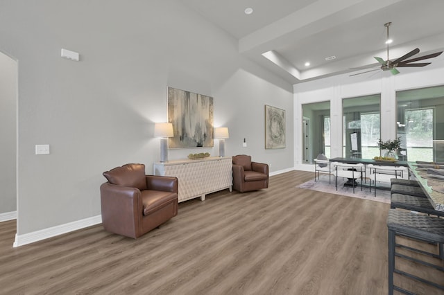 2172 Greentree Dr, Huntsville, TX 77340 - living area featuring wood finished floors, a ceiling fan, recessed lighting, and a raised ceiling