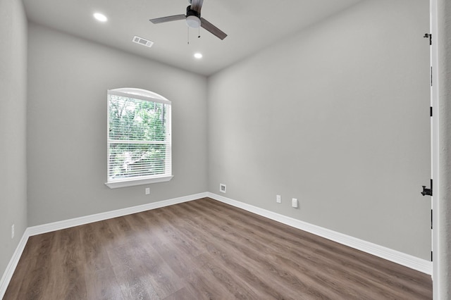 2172 Greentree Dr, Huntsville, TX 77340 - spare room with ceiling fan, dark wood-style flooring, and recessed lighting