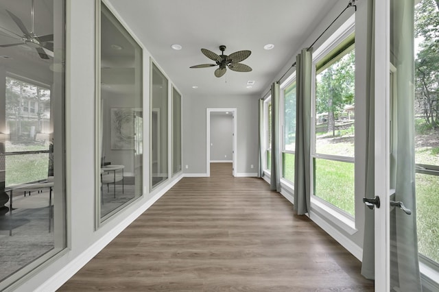 2172 Greentree Dr, Huntsville, TX 77340 - unfurnished sunroom with wood finished floors and recessed lighting