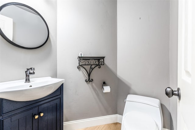 1526 Pecan Crossing Dr, Richmond, TX 77406 - half bathroom with vanity and wood finished floors