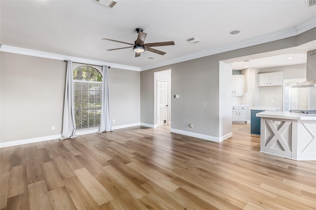 1526 Pecan Crossing Dr, Richmond, TX 77406 - unfurnished living room featuring ceiling fan, light wood-type flooring, and ornamental molding