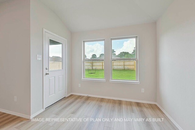 217 Rockbridge Dr, Huntsville, TX 77340 - entryway with light wood-style floors and lofted ceiling