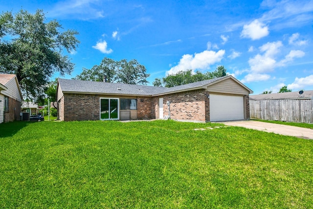 14511 Lourdes Dr, Houston, TX 77049 - view of front of home with brick siding, concrete driveway, and a garage