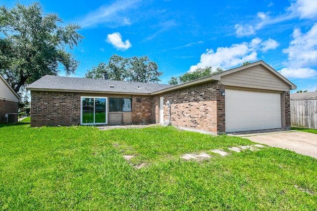 14511 Lourdes Dr, Houston, TX 77049 - single story home with brick siding, a garage, and driveway