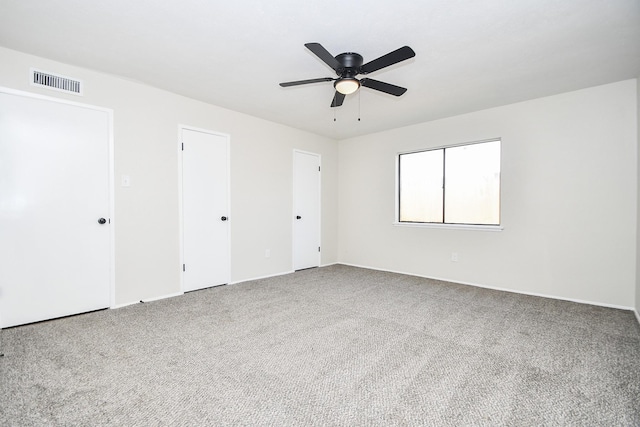 14511 Lourdes Dr, Houston, TX 77049 - unfurnished bedroom with carpet floors and a ceiling fan