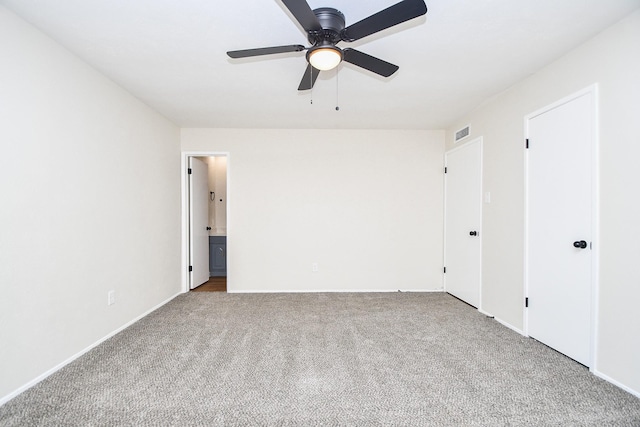 14511 Lourdes Dr, Houston, TX 77049 - carpeted spare room featuring a ceiling fan and baseboards