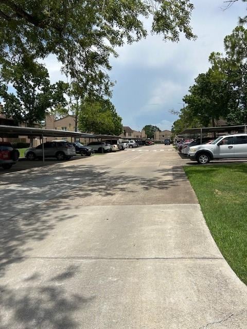 10555 Turtlewood Ct Unit 2111, Houston, TX 77072 - view of concrete road with a residential view