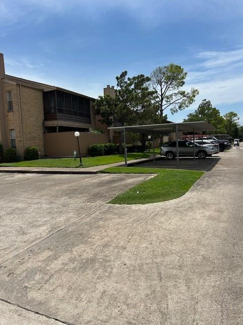 10555 Turtlewood Ct Unit 2111, Houston, TX 77072 - view of parking / parking lot
