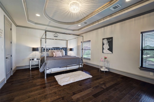 7507 Emerald Meadow Ct, Katy, TX 77494 - bedroom featuring a tray ceiling, crown molding, hardwood / wood-style floors, a chandelier, and recessed lighting