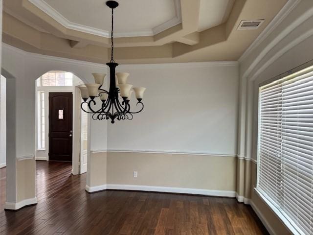 12911 Long Hunter Ct, Humble, TX 77346 - unfurnished dining area featuring a chandelier, dark wood-style floors, a tray ceiling, and crown molding