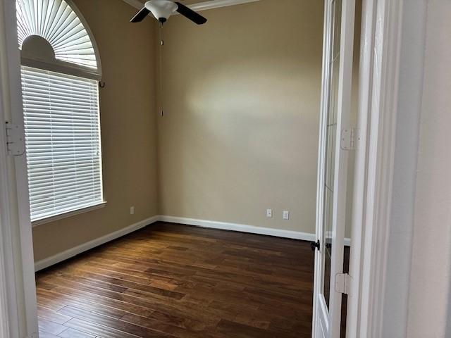 12911 Long Hunter Ct, Humble, TX 77346 - unfurnished room featuring dark wood-style flooring and a ceiling fan