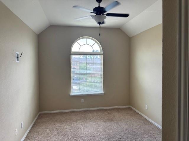 12911 Long Hunter Ct, Humble, TX 77346 - unfurnished room featuring vaulted ceiling, a ceiling fan, and carpet flooring