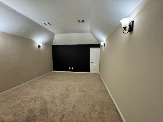 12911 Long Hunter Ct, Humble, TX 77346 - home theater room with light carpet and vaulted ceiling