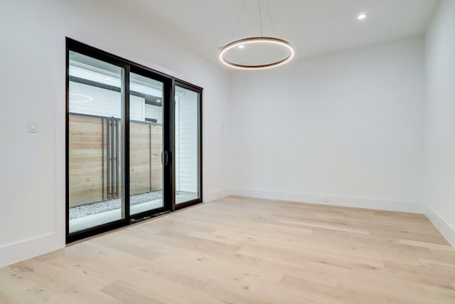 1022 Allston St, Houston, TX 77008 - unfurnished room with light wood finished floors and recessed lighting