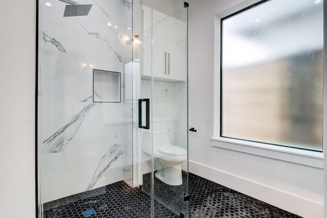 1022 Allston St, Houston, TX 77008 - bathroom with toilet and a marble finish shower