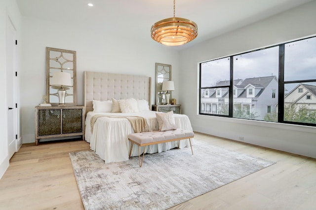 1022 Allston St, Houston, TX 77008 - bedroom with light wood-type flooring and recessed lighting