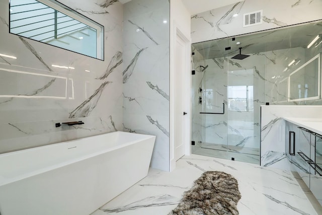 1022 Allston St, Houston, TX 77008 - full bathroom featuring a marble finish shower, a freestanding tub, vanity, and marble tiled floors