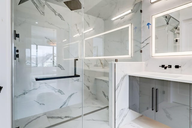 1022 Allston St, Houston, TX 77008 - bathroom with a marble finish shower, marble tiled floors, and vanity