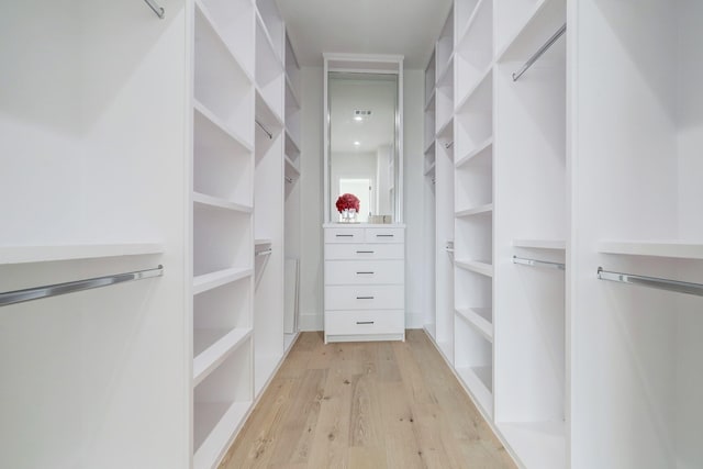1022 Allston St, Houston, TX 77008 - walk in closet with light wood-style flooring