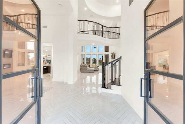 19303 Tree Canopy Ct, Cypress, TX 77433 - hall featuring a high ceiling and stairs