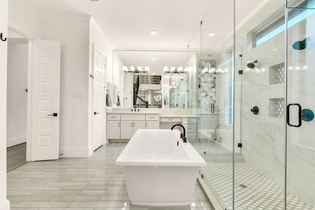19303 Tree Canopy Ct, Cypress, TX 77433 - bathroom featuring a freestanding bath, vanity, a shower stall, and ornamental molding