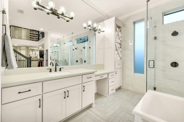 19303 Tree Canopy Ct, Cypress, TX 77433 - full bathroom with a marble finish shower, vanity, a chandelier, a soaking tub, and ornamental molding