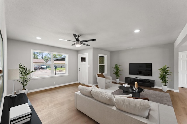 5210 Verdome Ln, Houston, TX 77092 - living room featuring wood finished floors, ceiling fan, and recessed lighting