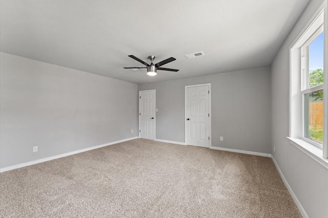5210 Verdome Ln, Houston, TX 77092 - spare room featuring ceiling fan, carpet, and plenty of natural light