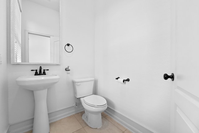 16746 Highland Country Dr, Cypress, TX 77433 - bathroom featuring toilet and tile patterned floors